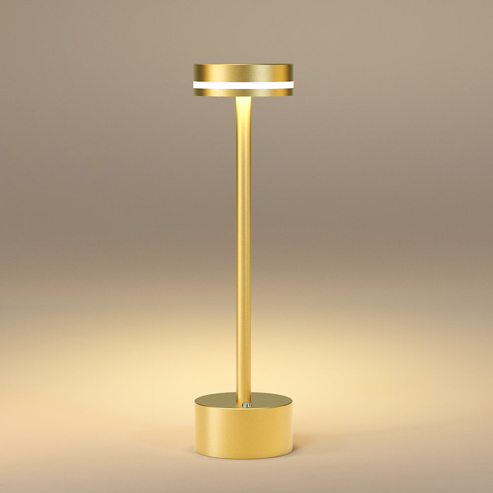 Luxurious gold wireless LED lamp offering portable and sophisticated ambient lighting
