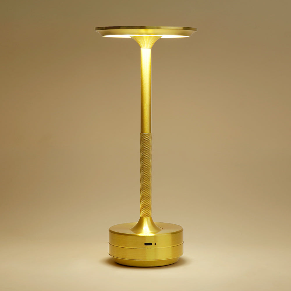 Chic gold-tone wireless LED table lamp providing portable and stylish ambient lighting
