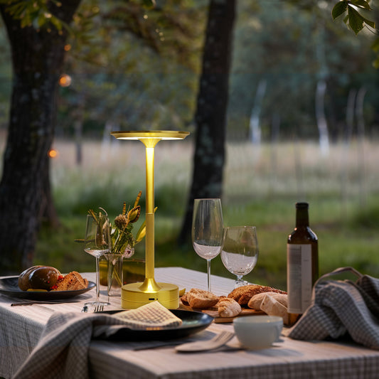 Sophisticated gold LED cordless table lamp with wireless design for elegant home illumination